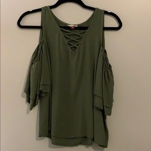 green criss cross shirt
